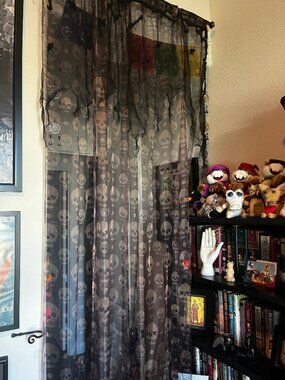Sheer Black with Gold Skulls Curtain